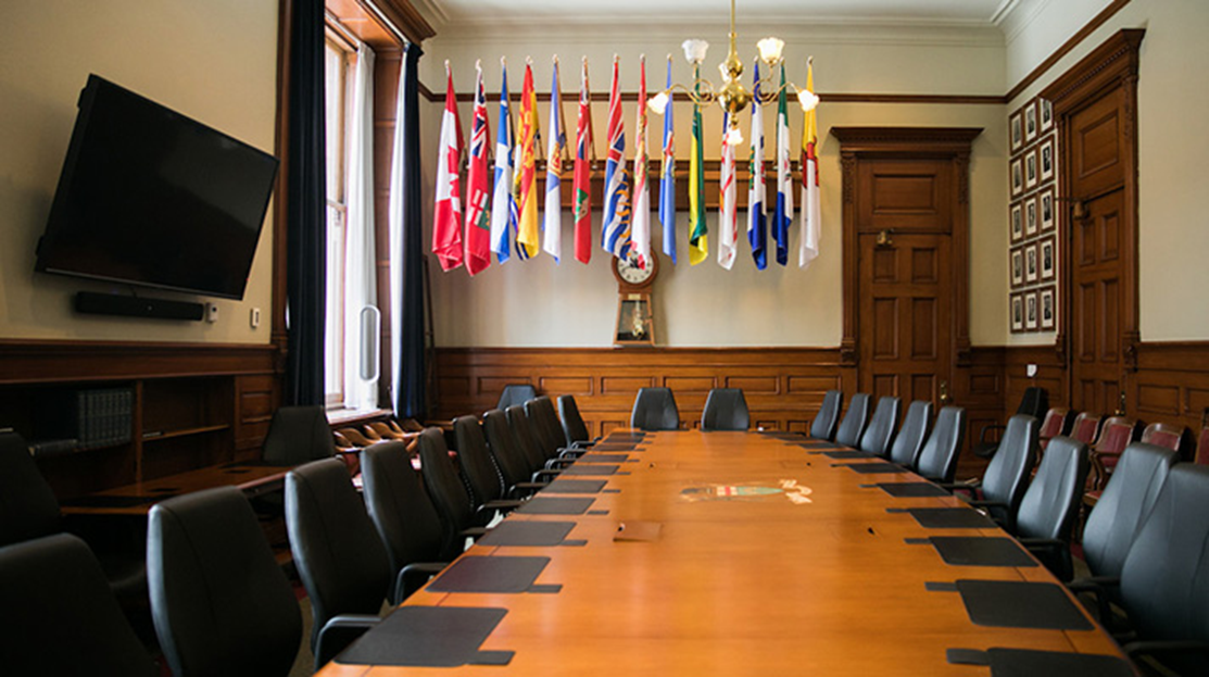 empty boardroom with table and chairs