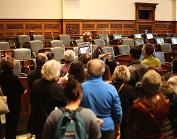 A group of visitors on a guided tour at the Legislative Assembly.